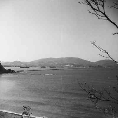 View of ships in distant harbor