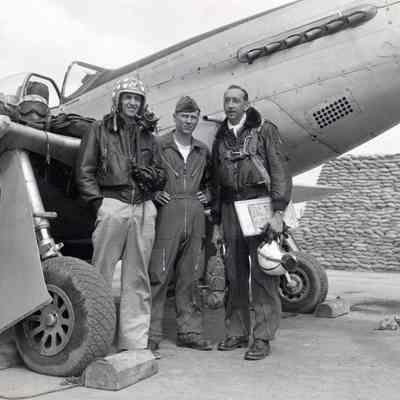 Pilots in front of P-51 Mustang