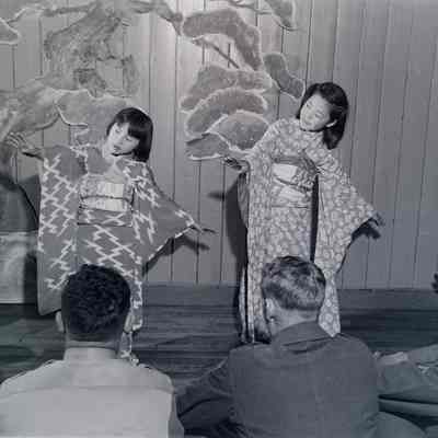 Japanese children dancing on stage for soldiers