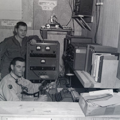 Officer and soldier in a radio room