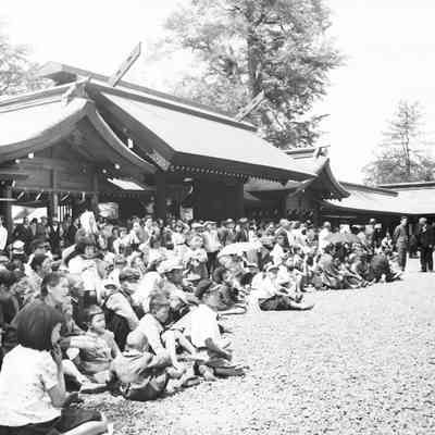 Spectators watch religious ceremony