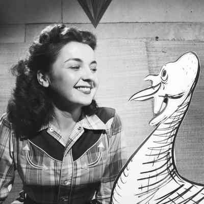 Woman with cartoon turkey cutout