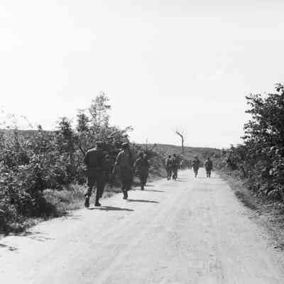 Soldiers on road march
