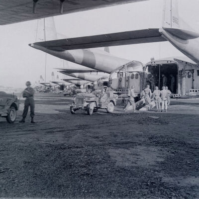 Jeeps unloading from a C-119 cargo aircraft