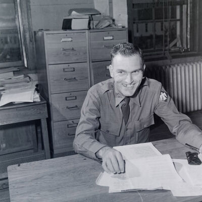 Unknown officer at his desk