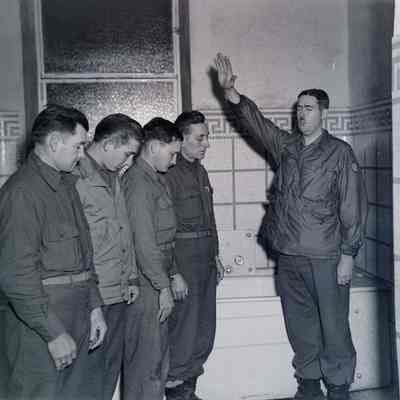 Soldiers receiving a blessing from a chaplain