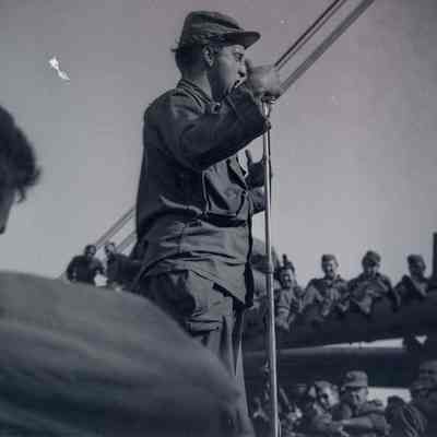 Soldier at microphone