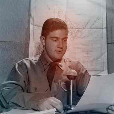 Soldier speaking into a microphone