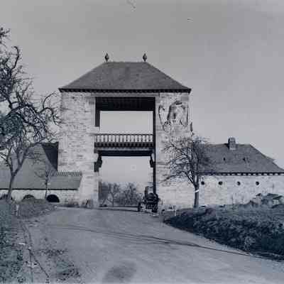 Gate entrance with tank to the right