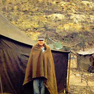 Soldier wrapped in blanket
