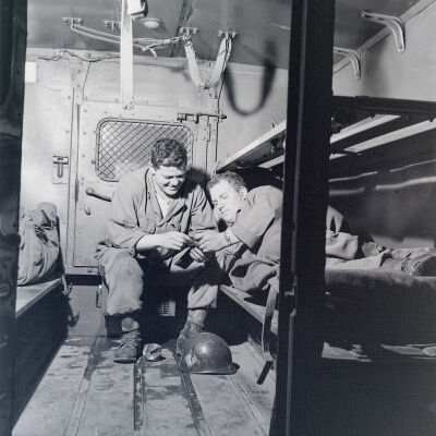 Soldiers relaxing in the back of an ambulance