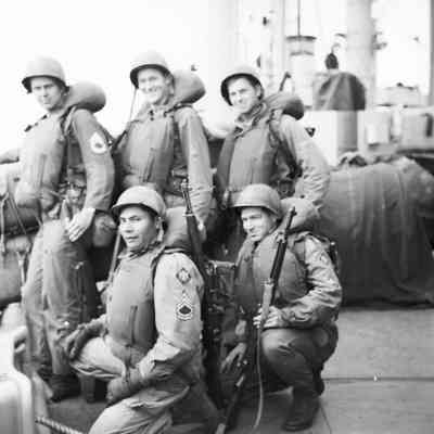 Soldiers on deck with life vests