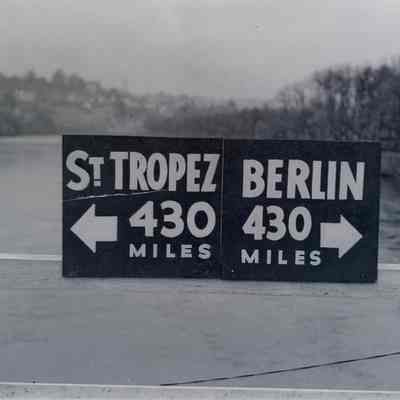 Sign signaling halfway point between Southern France landings and Berlin