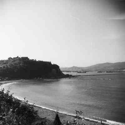 View of ships in distant harbor