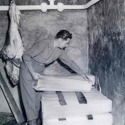 Soldier working in meat locker