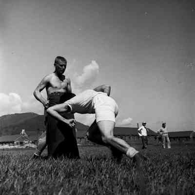 Soldier tackling a punching bag