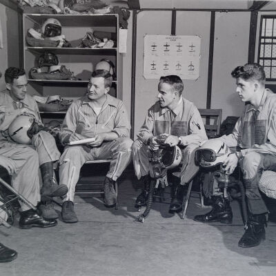 Air Force pilots suited-up in barracks