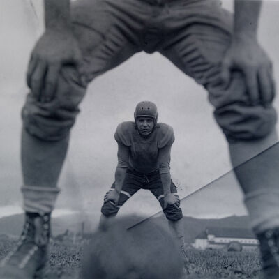 Looking between the legs of a football center