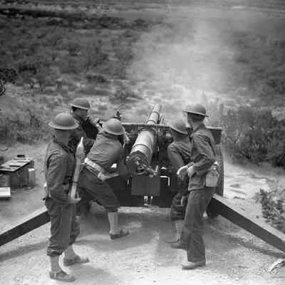 Artillery crew firing their piece