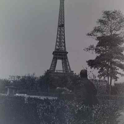 Soldier looking at Eiffel Tower
