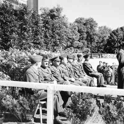 Officer reading at podium