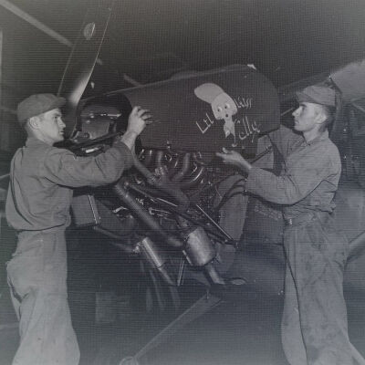 Mechanics working on light aircraft