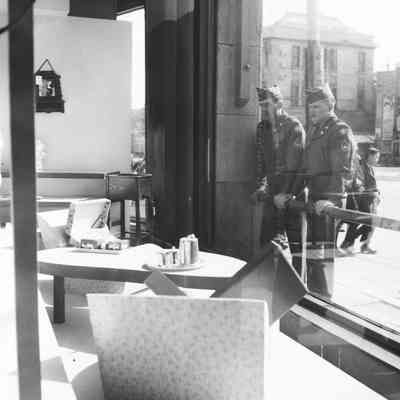 Soldiers window shopping