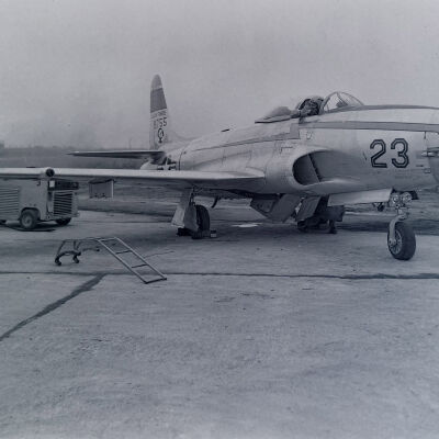 P-80 fighter and pilot on flight line