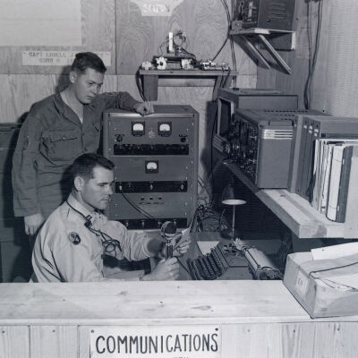 Radio operator and officer in radio room