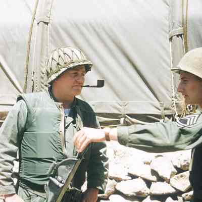 Chaplain talking to another soldier