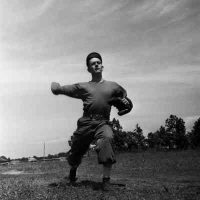 Soldier throwing a baseball