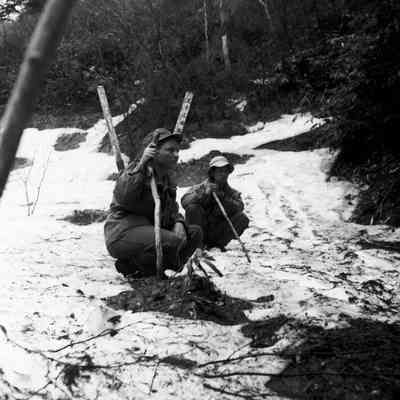 Soldier and a Japanese forester in the woods