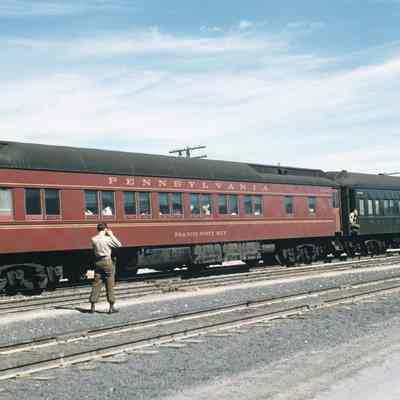 Soldier taking a photo of a troop train
