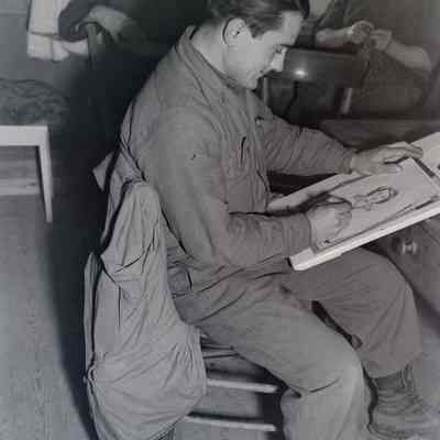 Soldier drawing portraits