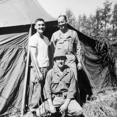 Group of soldiers in front of a tent