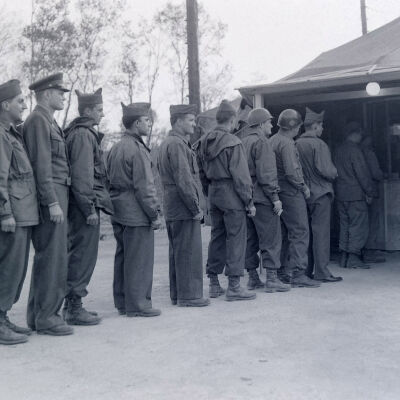 Soldiers in line for movie at theater