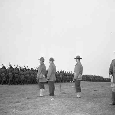 Soldiers marching in review