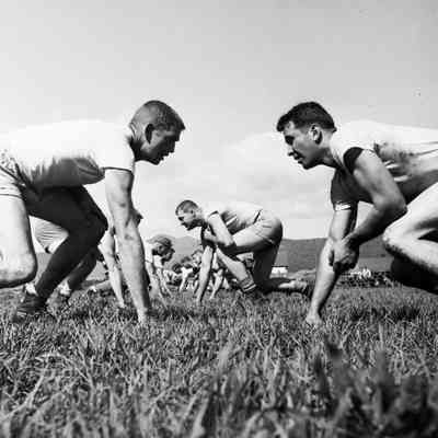 Soldiers lined up during football practice