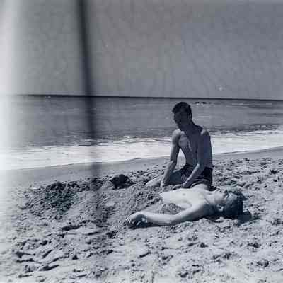 Soldiers relaxing on beach