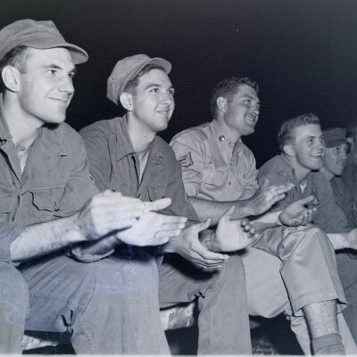 Soldiers applauding a show