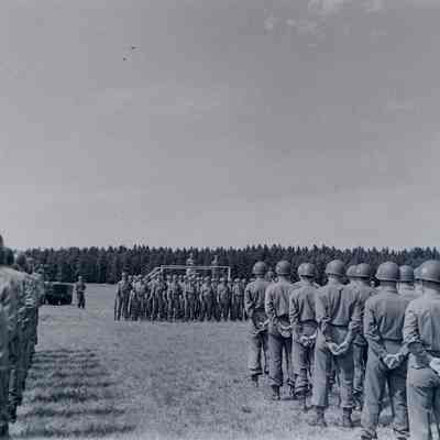 George Patton reviews the 45th Division