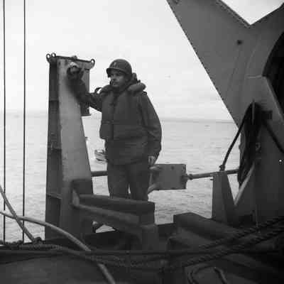 Soldier on deck with life vest