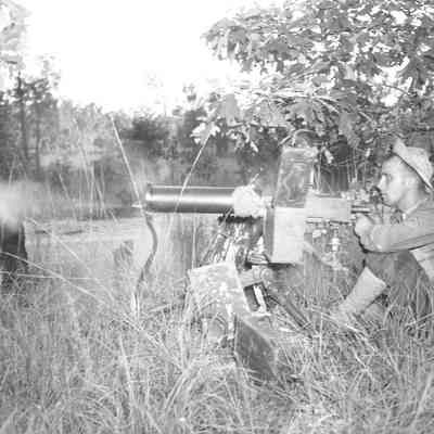 Soldier practicing on machine gun