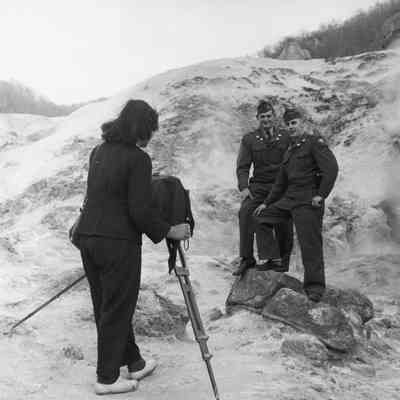 Soldiers having their photo taken by Japanese photographer
