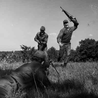 Soldiers enacting an infantry attack