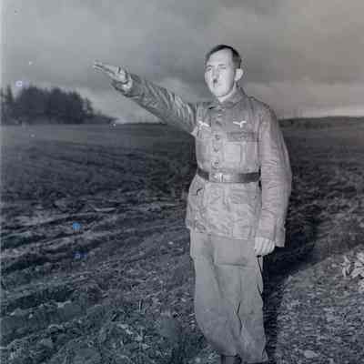 Unknown soldier dressed as Adolph Hitler
