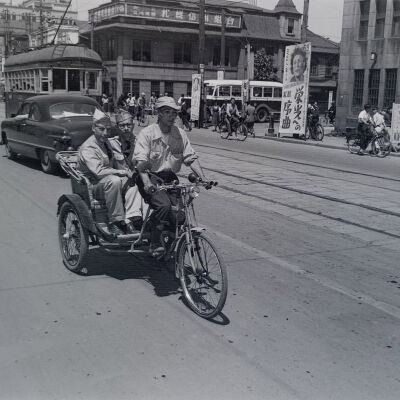 Two soldiers in a pedal cab in Sapporo