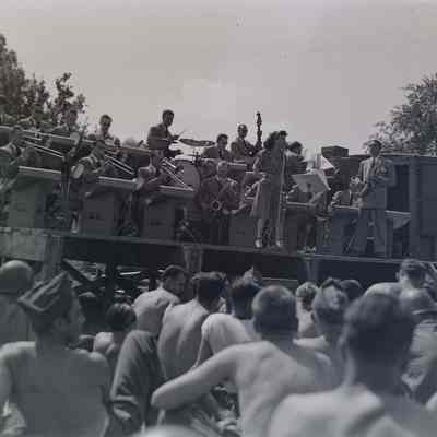 Soldiers listening to band