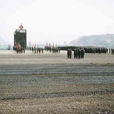 Soldiers standing at attention during review