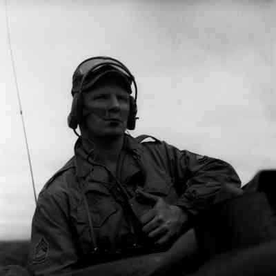 Tank commander seated in turret